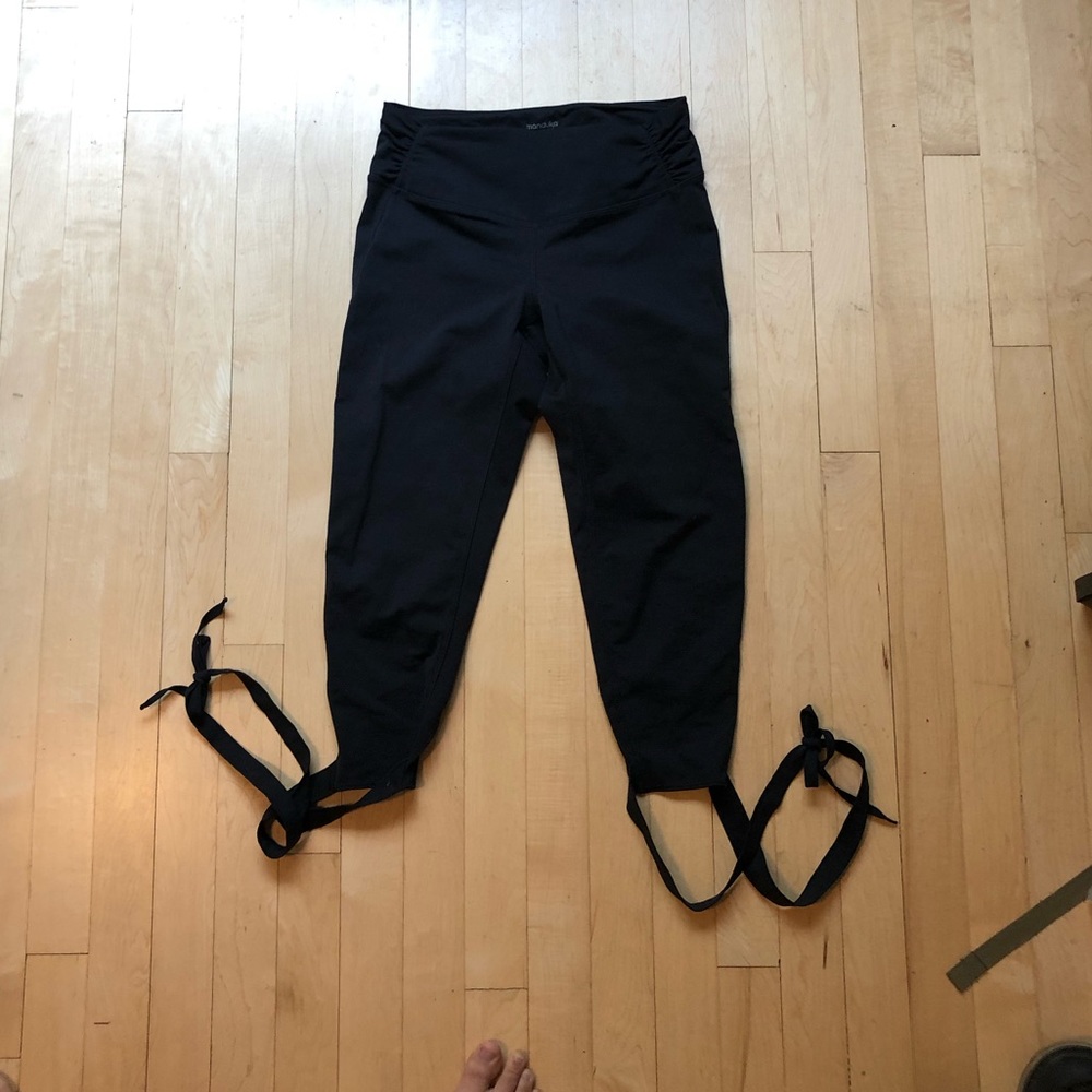 Black Manduka crop leggings with tie bottoms